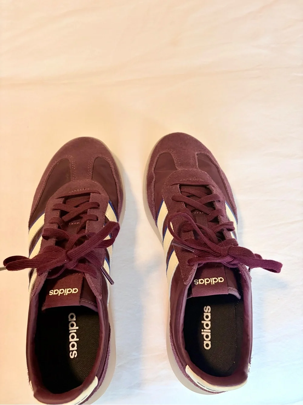 adidas burgundy and white suede sneakers with blue stripe accents